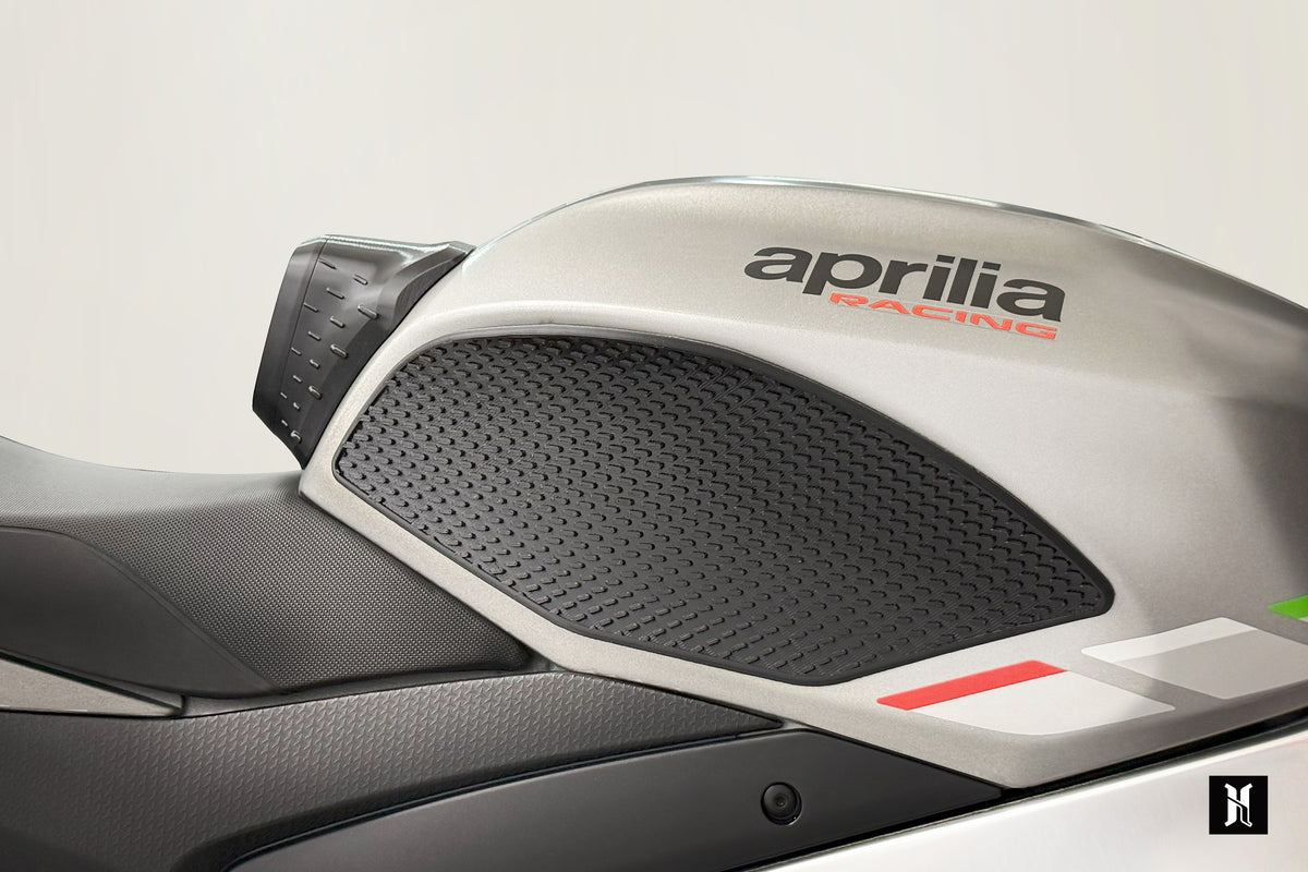side view of Aprilia RSV4 with MorphGrip tank pads installed showing aggressive styling and fuel tank grip integration