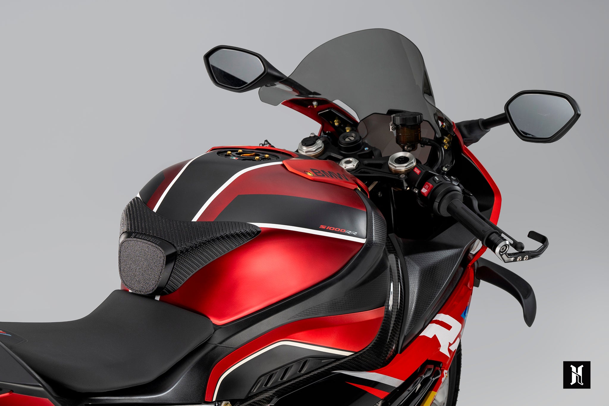 side view of EXT-SRR extension support kit showing raised 3D tank grip pad design for improved knee grip and rider control