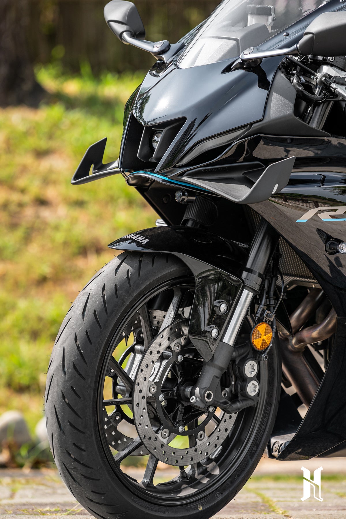 Close-up of carbon fiber reinforced thermoplastic material on HARMONIZE Yamaha R7 winglet