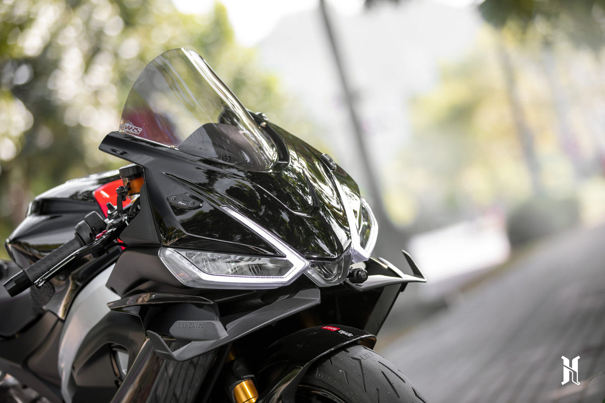Aprilia RS660 with HARMONIZE MotoTech winglets installed on front fairing, enhancing aerodynamic performance and styling