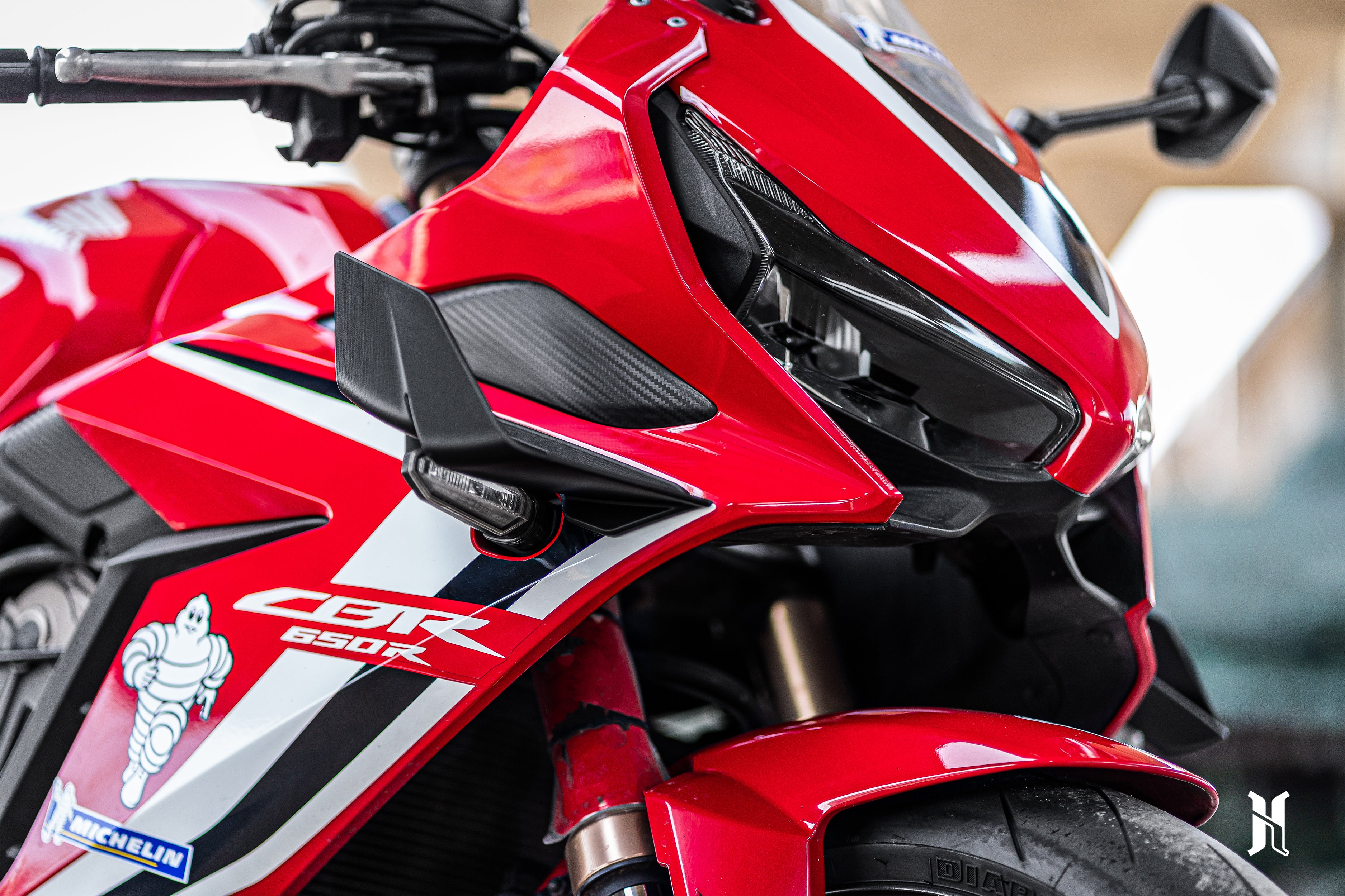 Airflow path design of CBR650R winglet engineered to guide air and improve stability