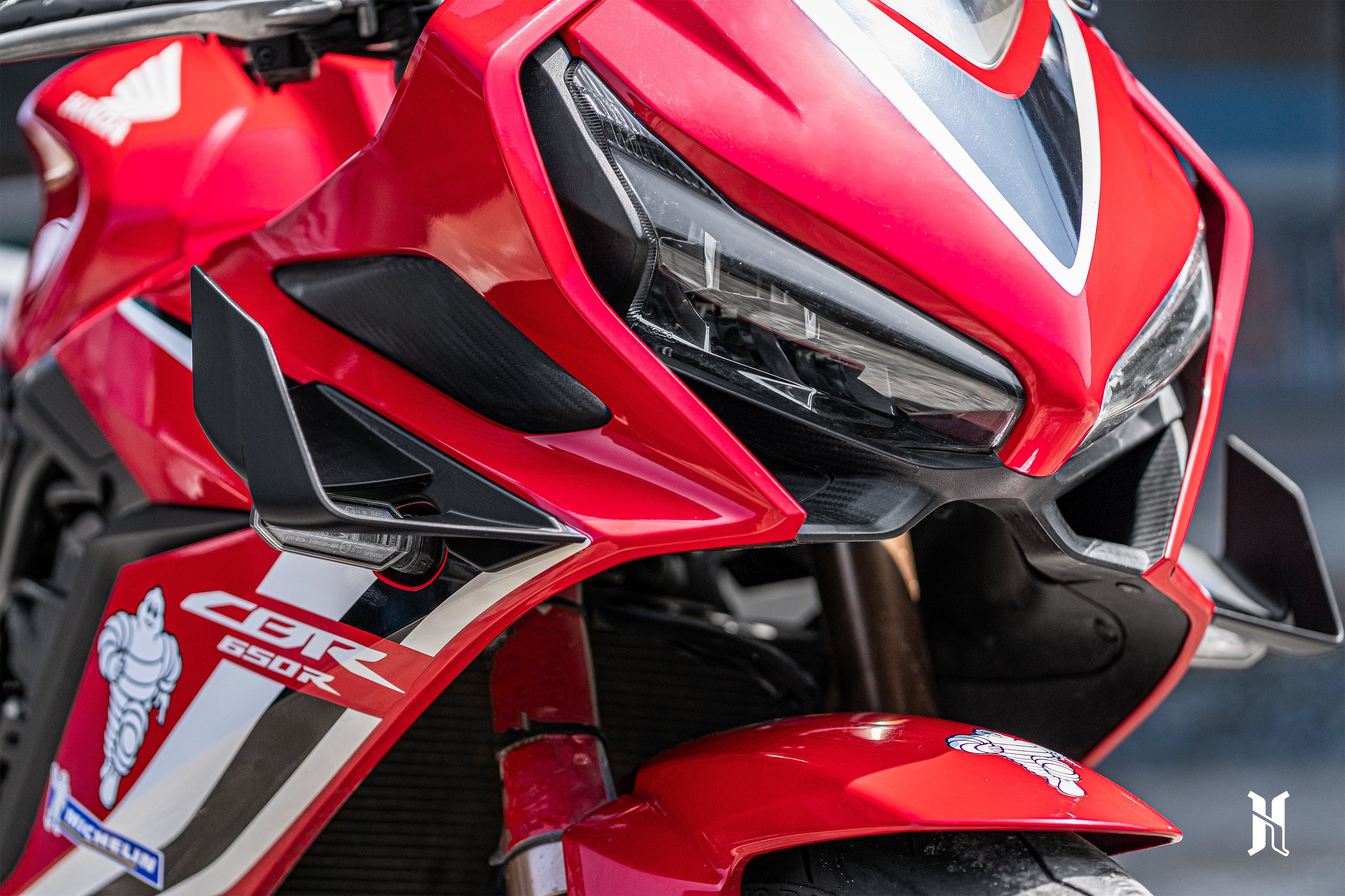 Close-up of CBR650R winglet contour designed for efficient airflow transition