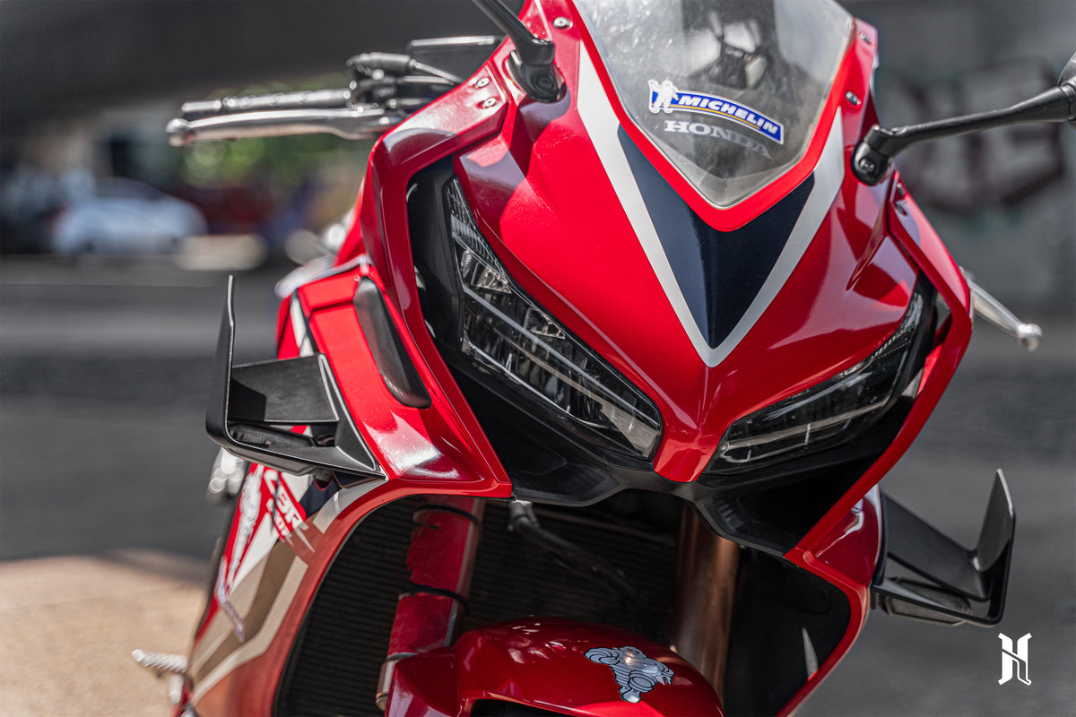 Winglet mounting fitment on Honda CBR650R showing clean integration with fairing