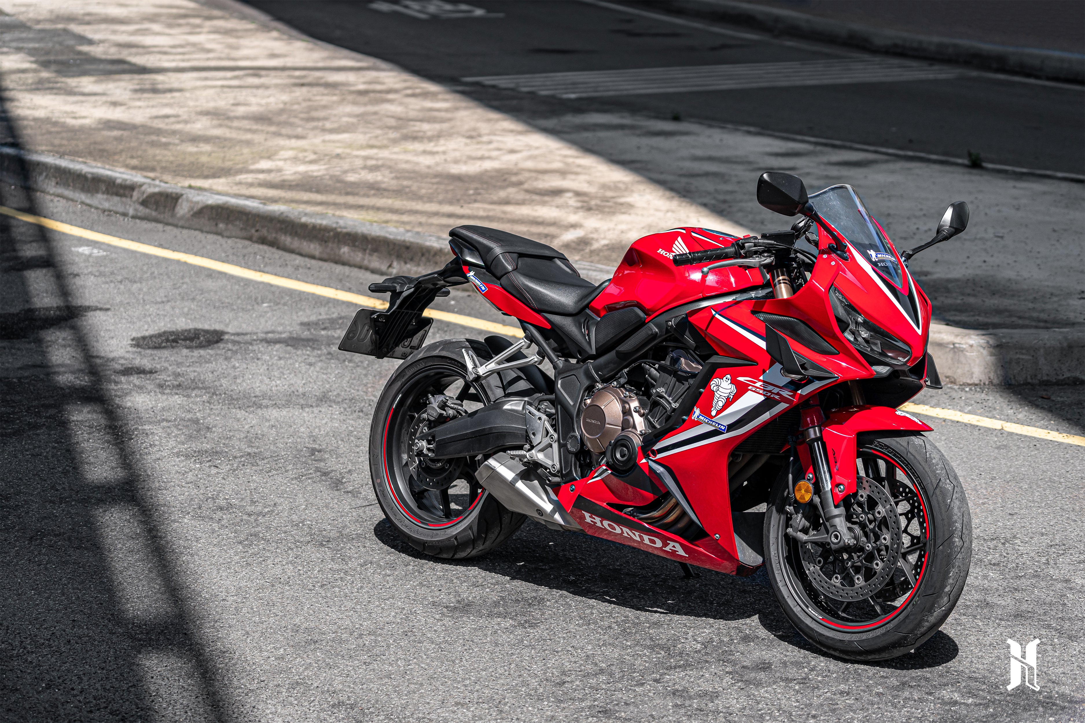 Side view of Honda CBR650R with integrated winglets showing smooth aerodynamic design flow