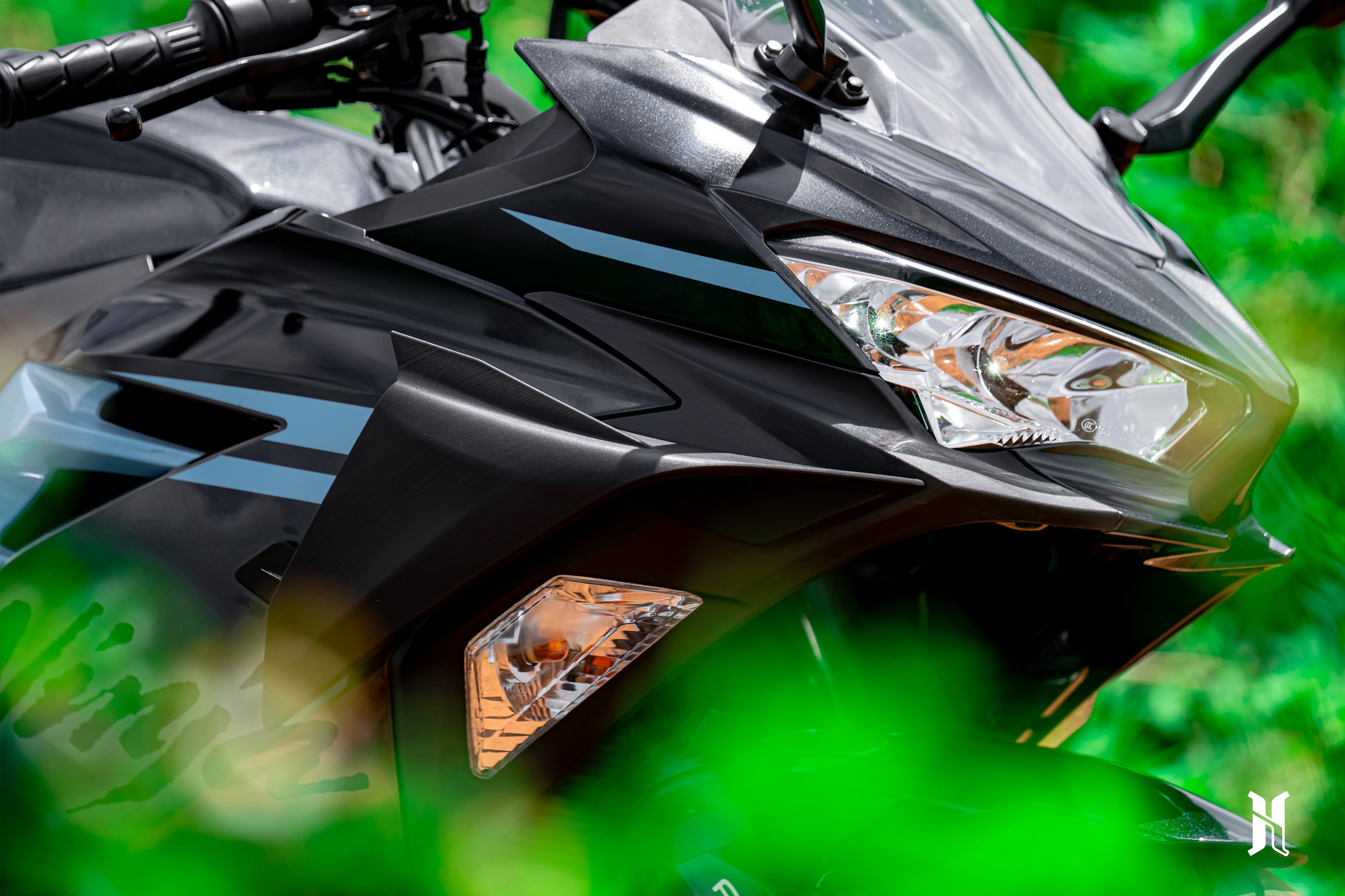 Harmonize aerodynamic winglets for Kawasaki Ninja 400, high-performance winglets for Kawasaki Ninja 400, Kawasaki Ninja 400 racing winglets, aerodynamic upgrades for Kawasaki Ninja 400, Ninja 400 performance upgrades, Ninja 400 racing modifications, Ninja 400 winglets for improved stability and speed, Kawasaki Ninja 400 custom parts