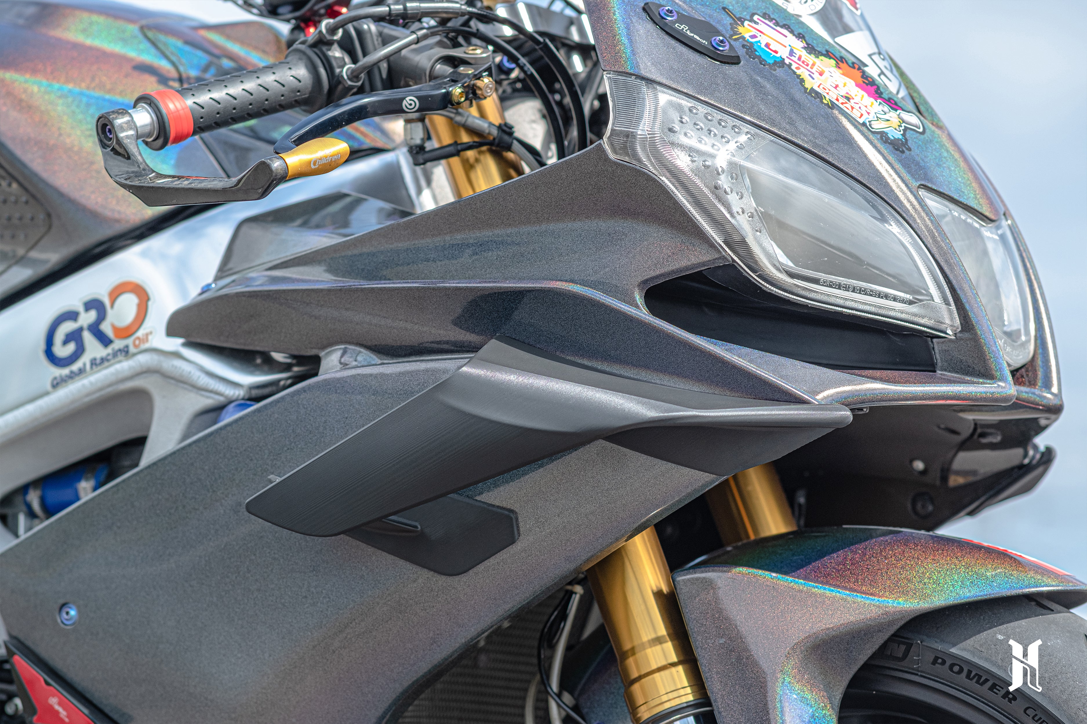 Close-up of RSV4 winglet contour designed for efficient airflow transition and aerodynamic performance