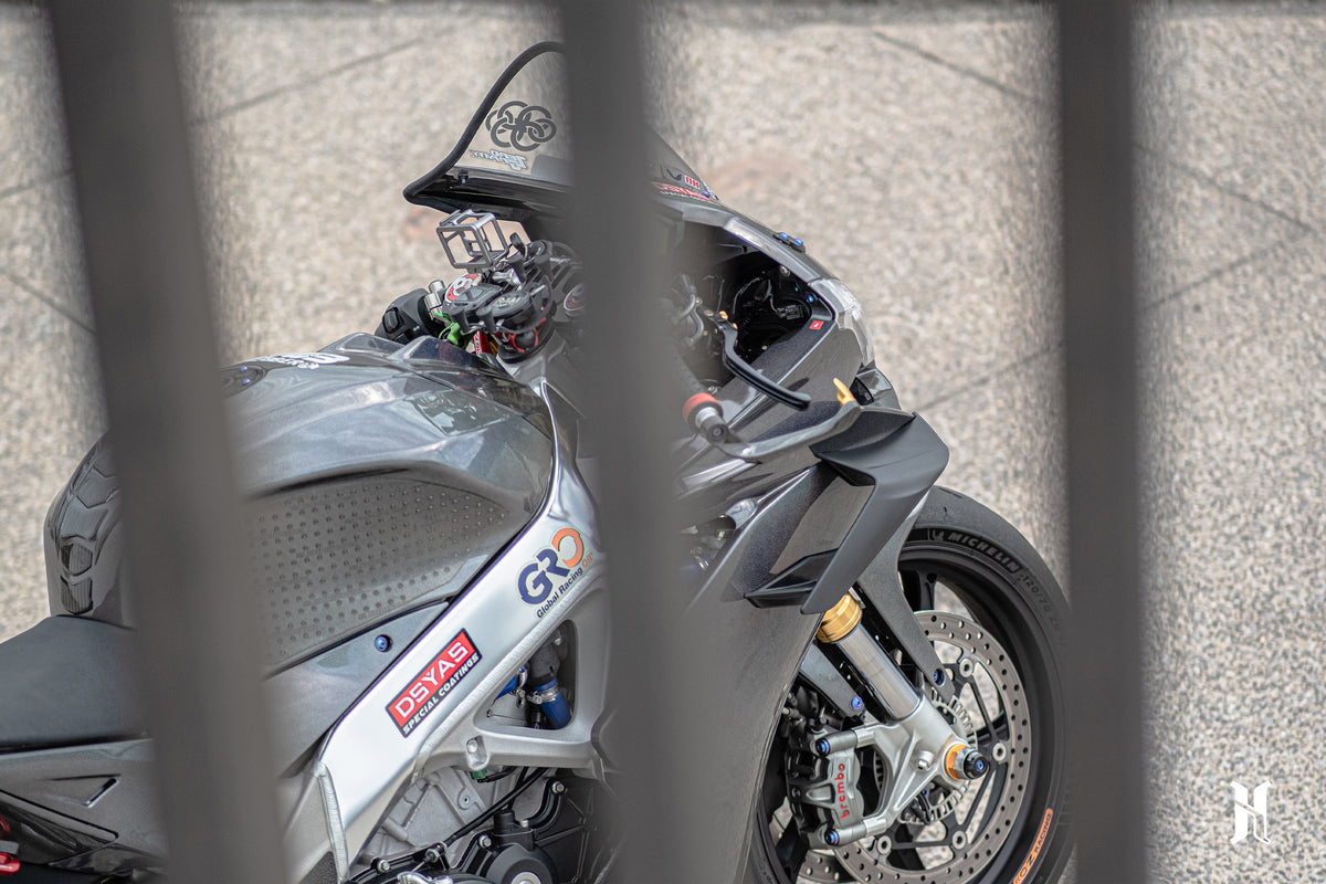 Aprilia RSV4 equipped with winglets demonstrating controlled airflow and enhanced stability in real riding conditions